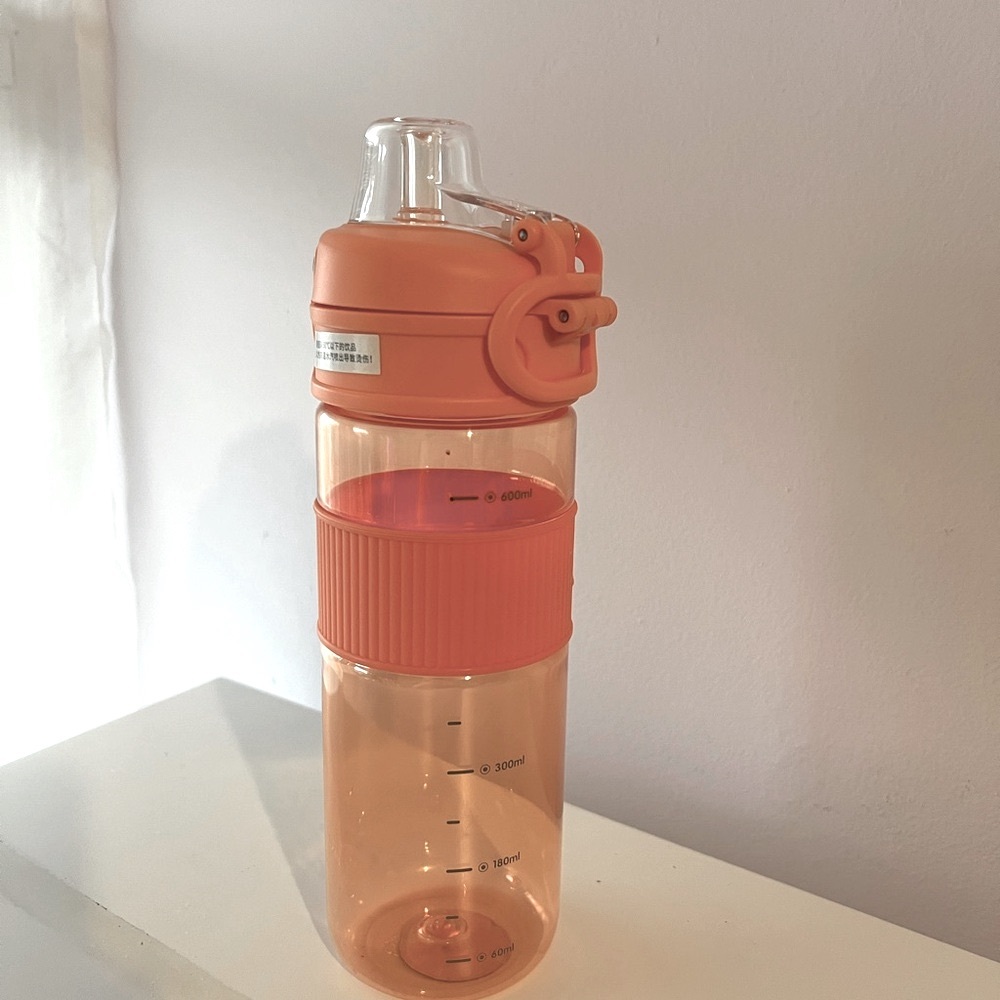 Orange Water Bottle with Flip Lid